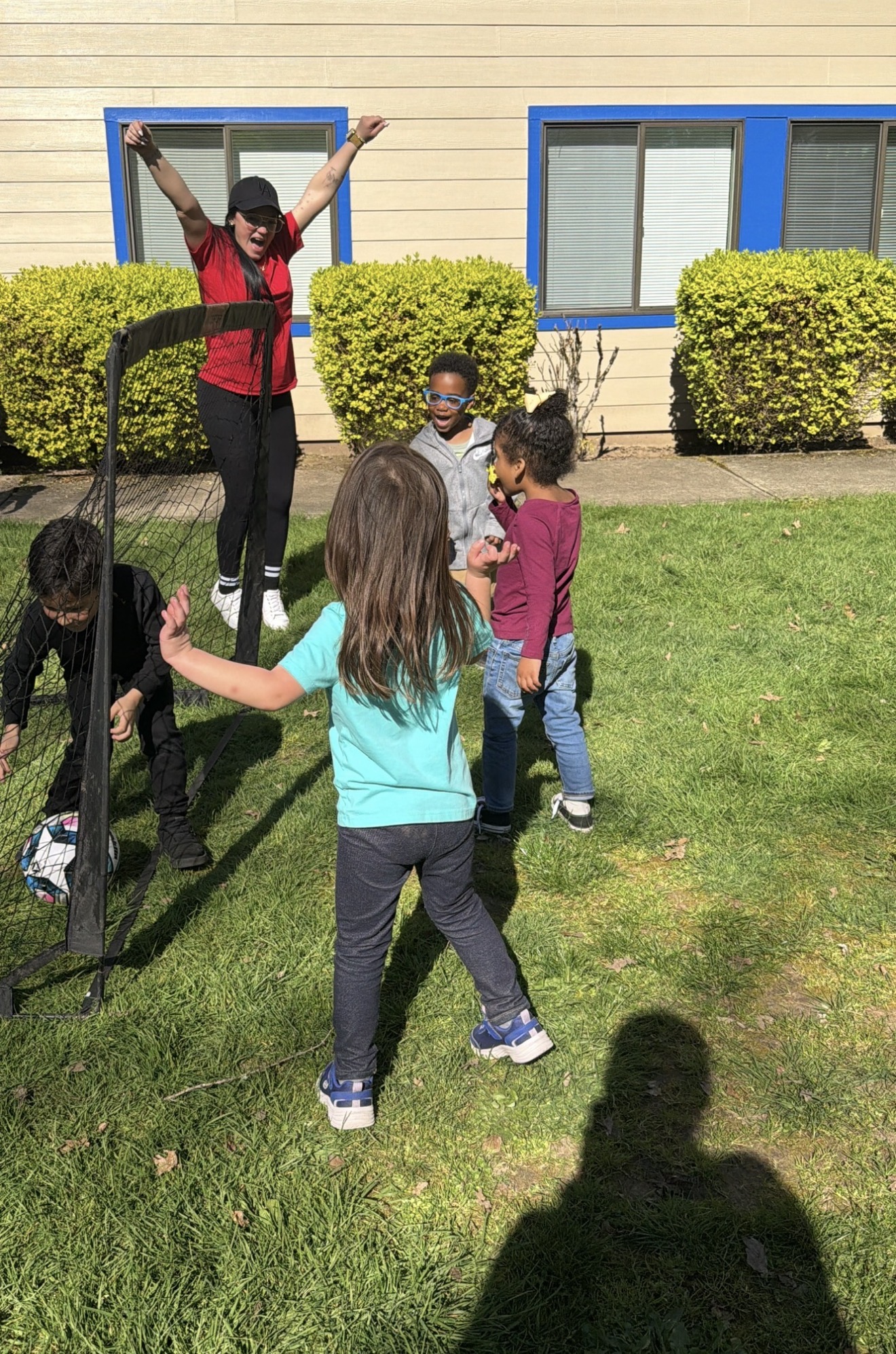Children active in the Movement workshop — sports, yoga, and dance
